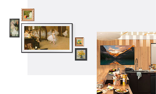 Four small paintings are arranged around a Frame TV hung on a wall with ballerinas dancing in a studio onscreen. Next to this, a TV with a landscape background on its display hangs on the wooden wall of a modern kitchen. Various foods and dishes are on the kitchen counter next to a sink.