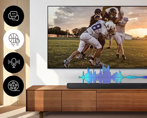 A TV cycles through different scenes, including a chat between two women, sports, news and a cinematic shot of a fisherman in a stormy sea. With each scene, an Ultra Slim Soundbar plays a different level of volume, indicated by a fluctuating audio bar.