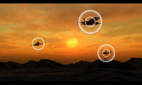 Fighter jets and a helicopter enter and exit a sunset scene. There are circular tracking graphics which simulate that their sound is following them as they move around the screen